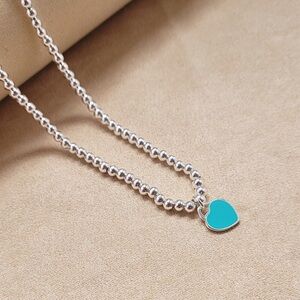 Tiffany & Co. Silver Bead Necklace with Turquoise Heart Charm
